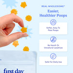 Hand holding a yellow star-shaped product with 'first day' branding on a light blue background.