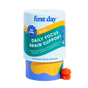First Day Kids Daily Focus Brain Support supplement packaging with a gummy bear on a white background