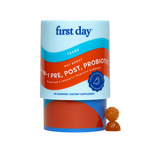 A bottle of Teens' 3-in-1 Pre+ Post+ Probiotic dietary supplement gummies for teen digestive health, with a blue and orange label and two brown gummies displayed in front.