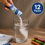 Hand pouring a packet of water supplement into a glass on a wooden table with '12 Packs' text.