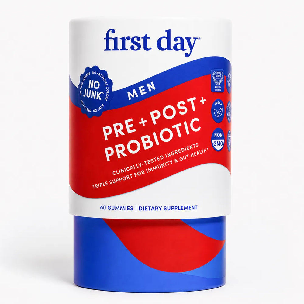 A cylindrical container of First Day Men Pre + Post + Probiotic dietary supplement gummies, featuring a white label with bold blue and red graphics on a clean white background.